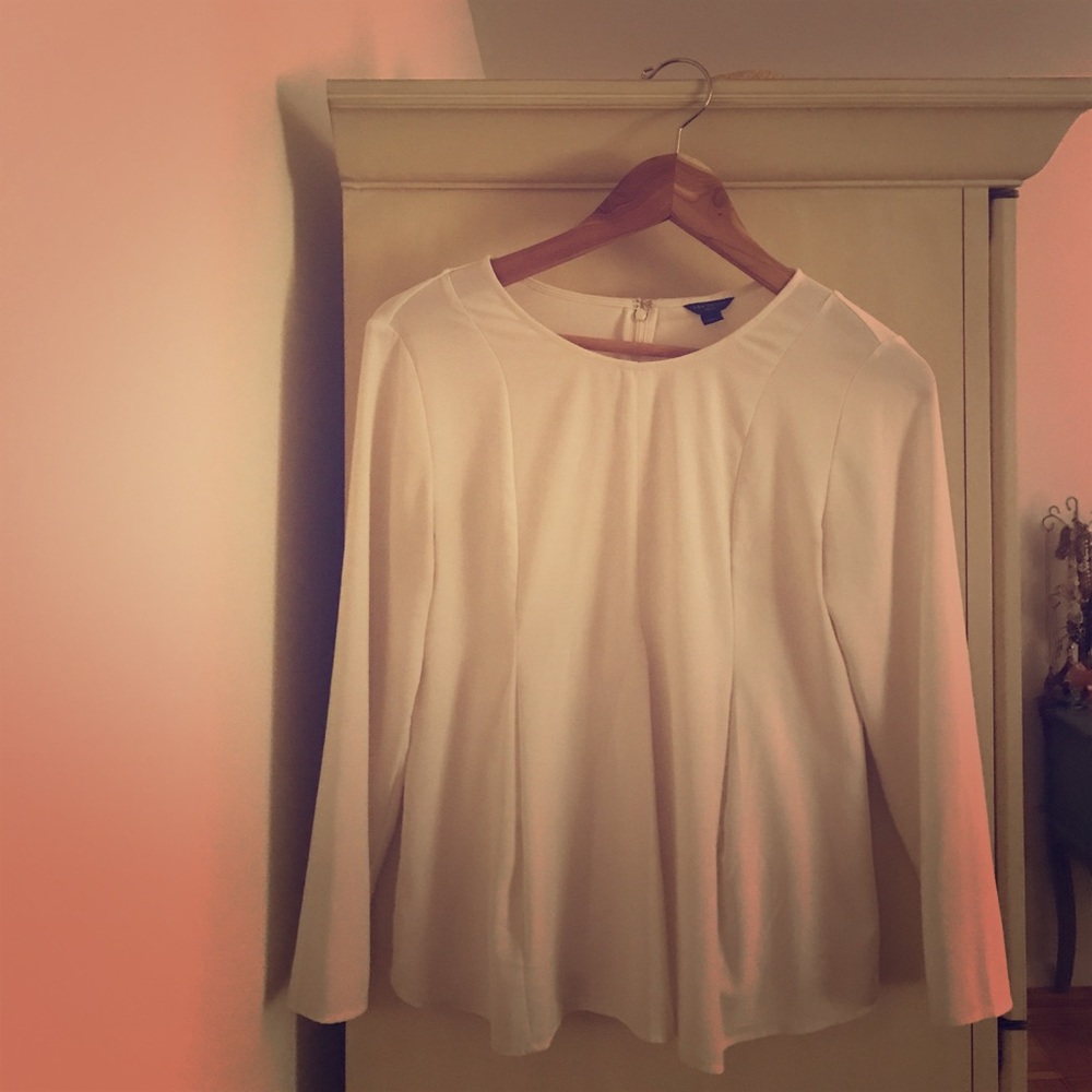 White blouse, flair at bottom